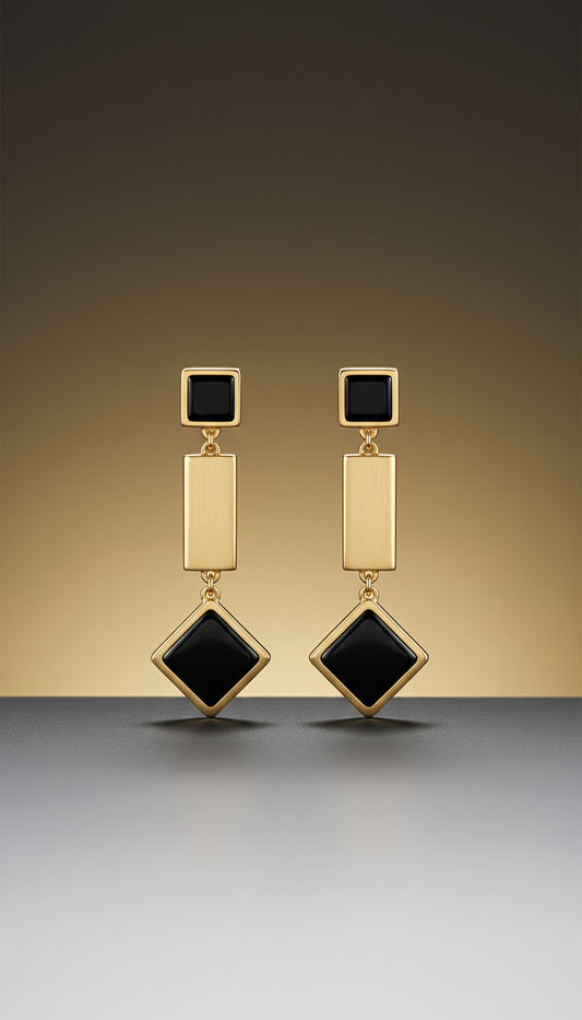Geometric drop earrings in 18k gold and onyx